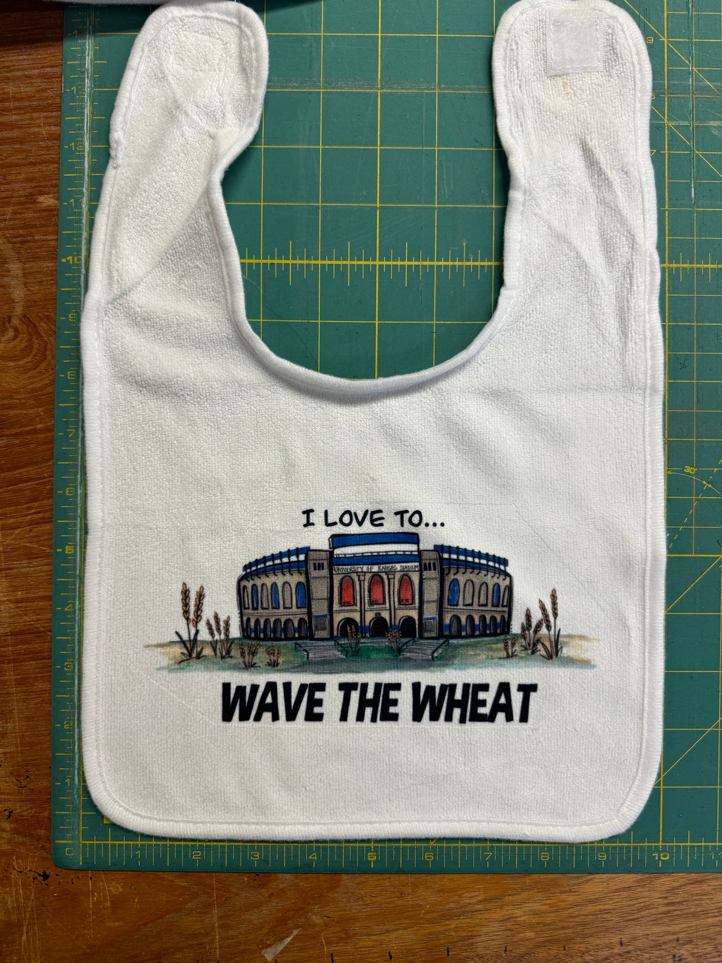 “I Love to Wave the Wheat” KU Football Baby Bib