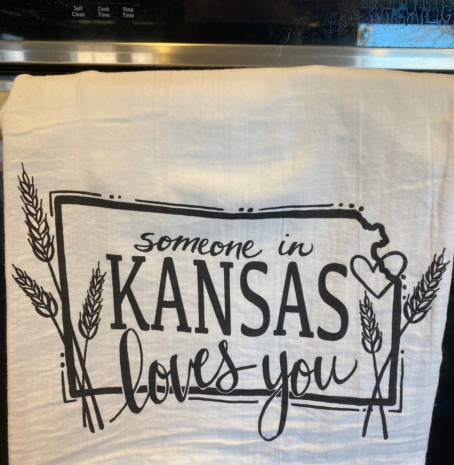 "Someone in Kansas Loves You" tea towel